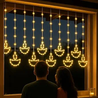 Diwali Combo of 8 Product : 24 Diya, 1 Charan, Shubh Labh, 1 Golden Light,  1 Star Curtain Light, 10 Feet Toran,  1 Normal Size Genda Gate Toran 4 Ghanti Latkan, 1 Warm White Leaft Light